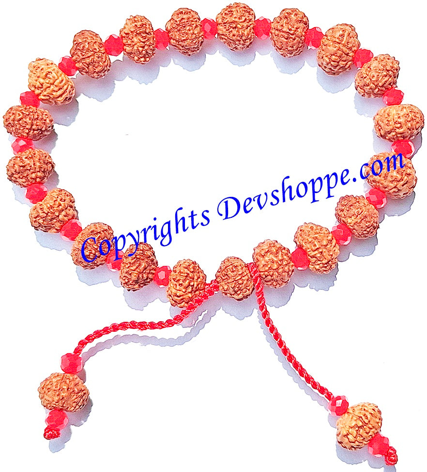 Nine faced Javanese Rudraksha wristband with glass spacers