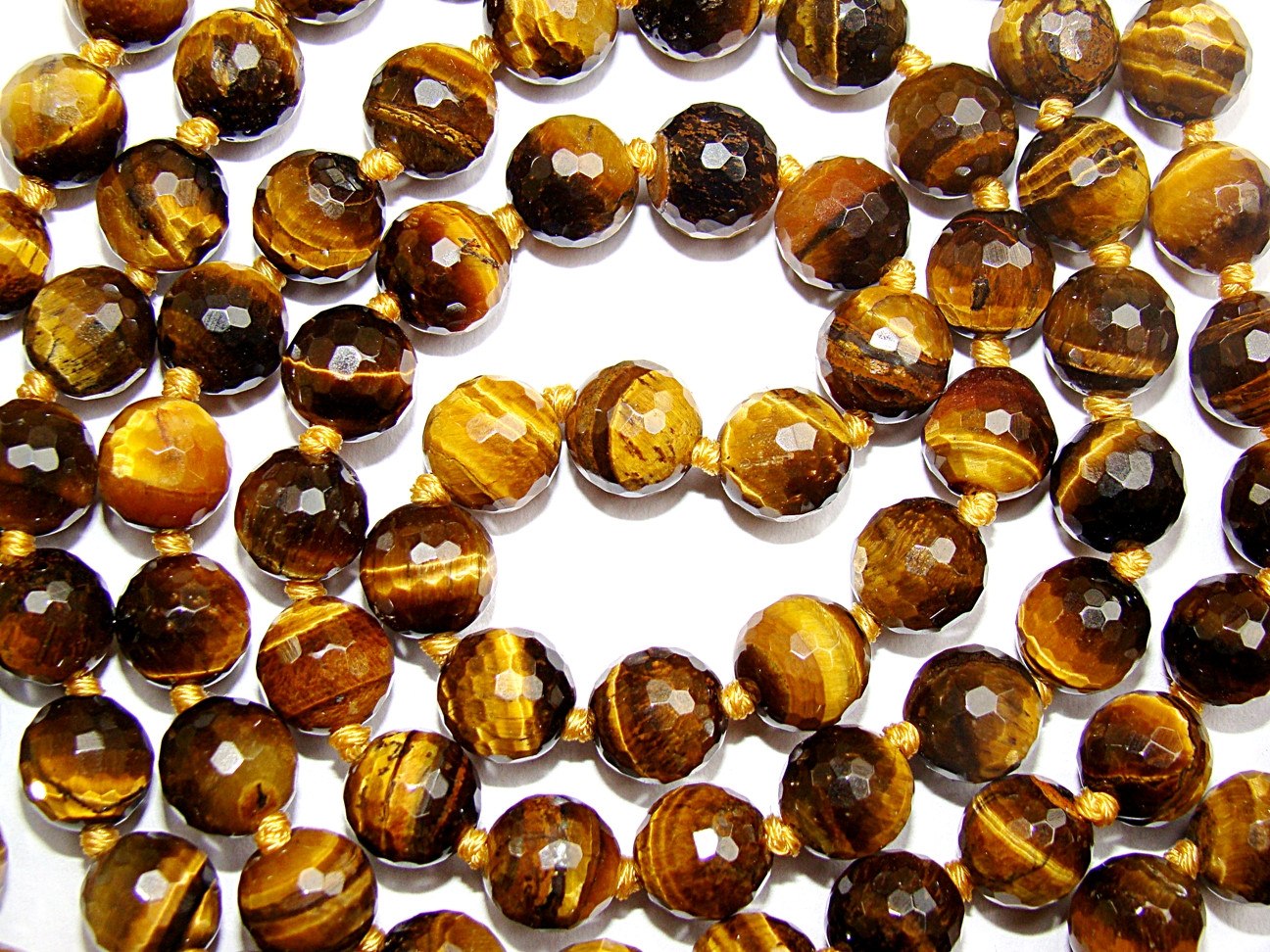 Tiger eye mala made from very high quality faceted beads for confidence and courage - Devshoppe